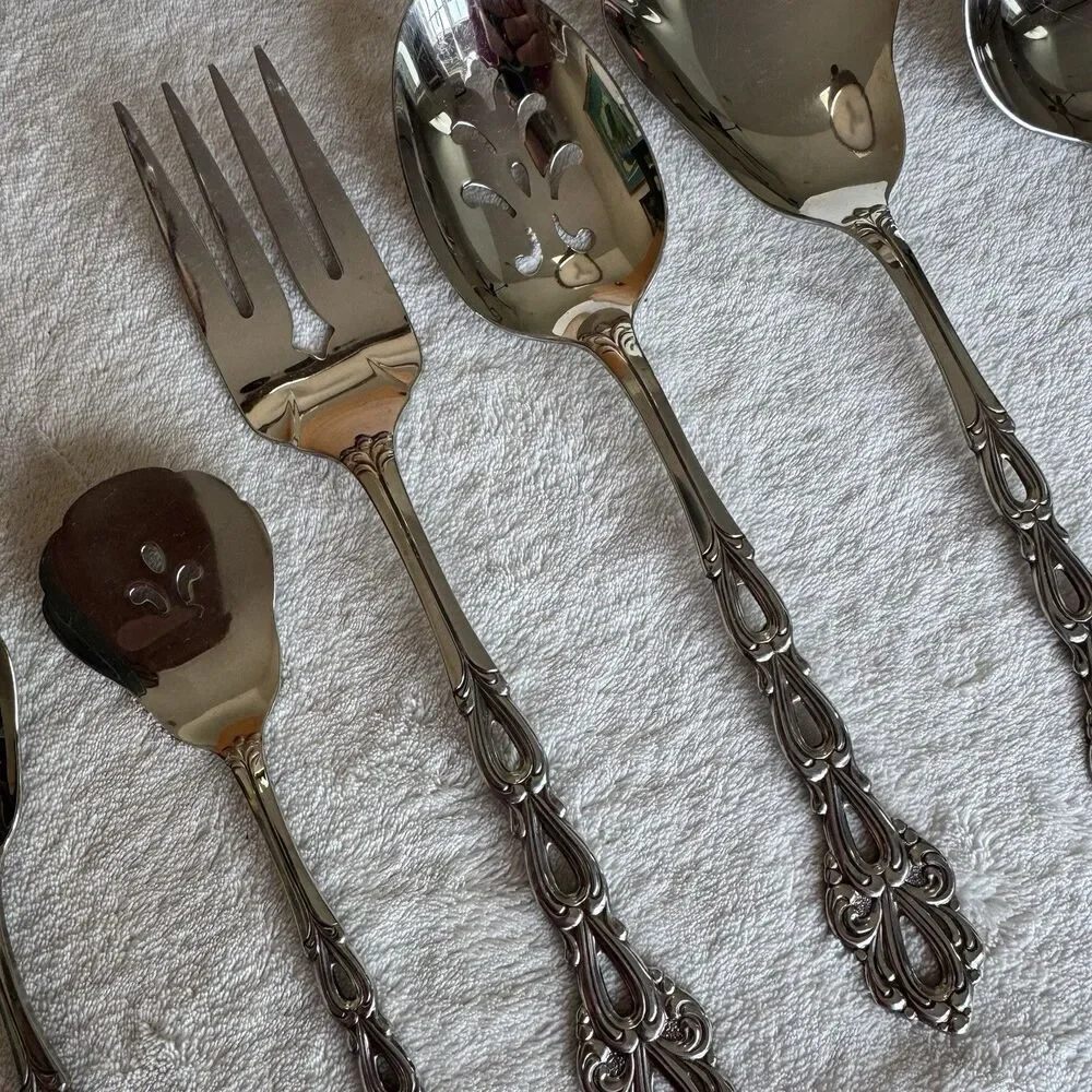 Vintage 7-piece Oneida Community Chandelier serving utensil set in stainless MCM